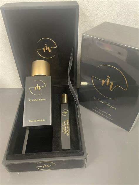 by initial parfum m